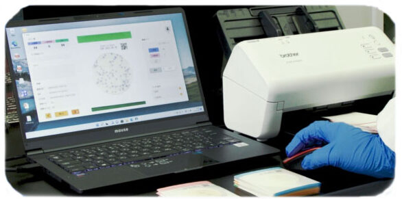 Easy Plate Scanner and Laptop showing scanner output